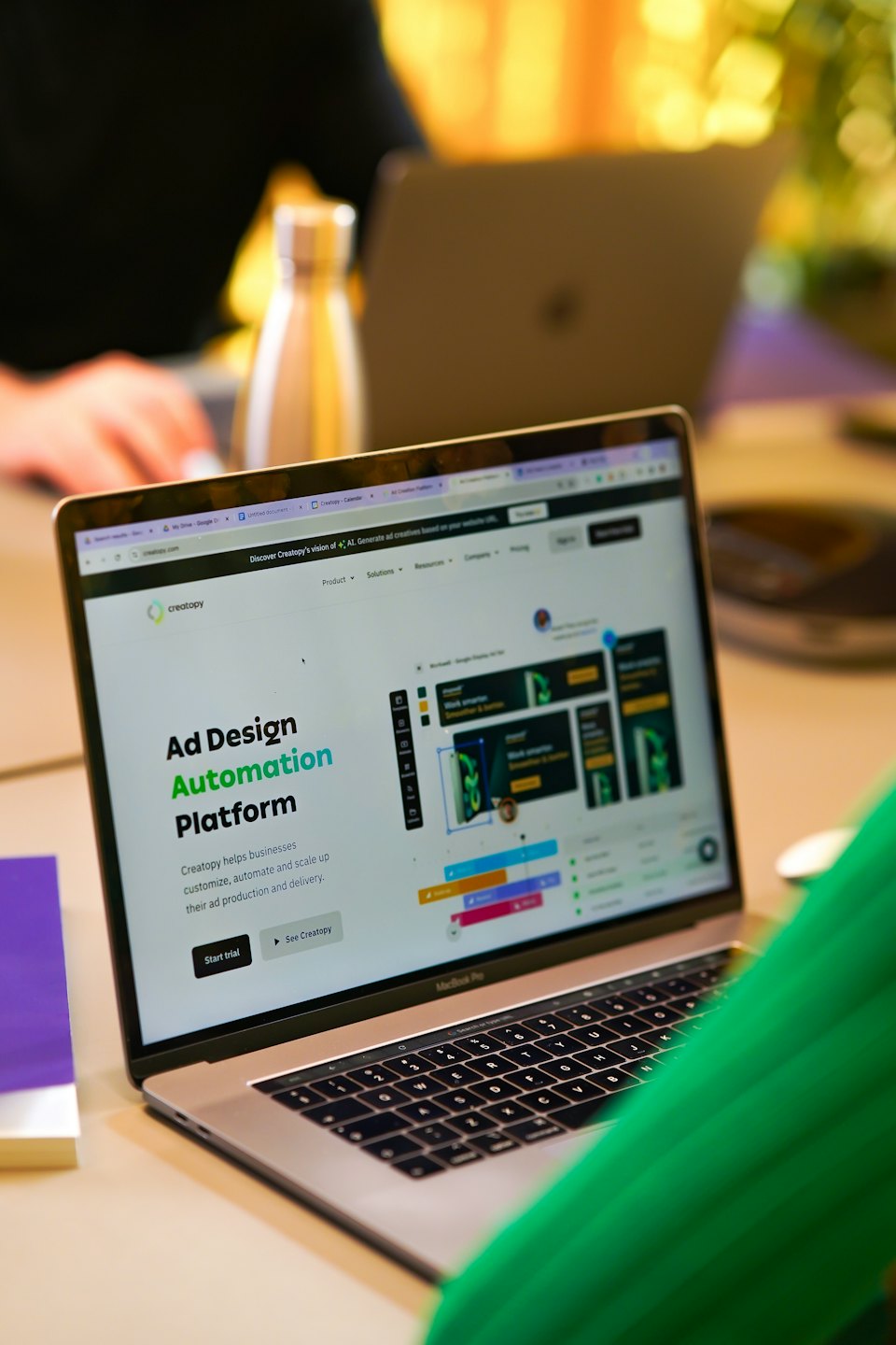 Laptop displaying an ad design automation platform website.